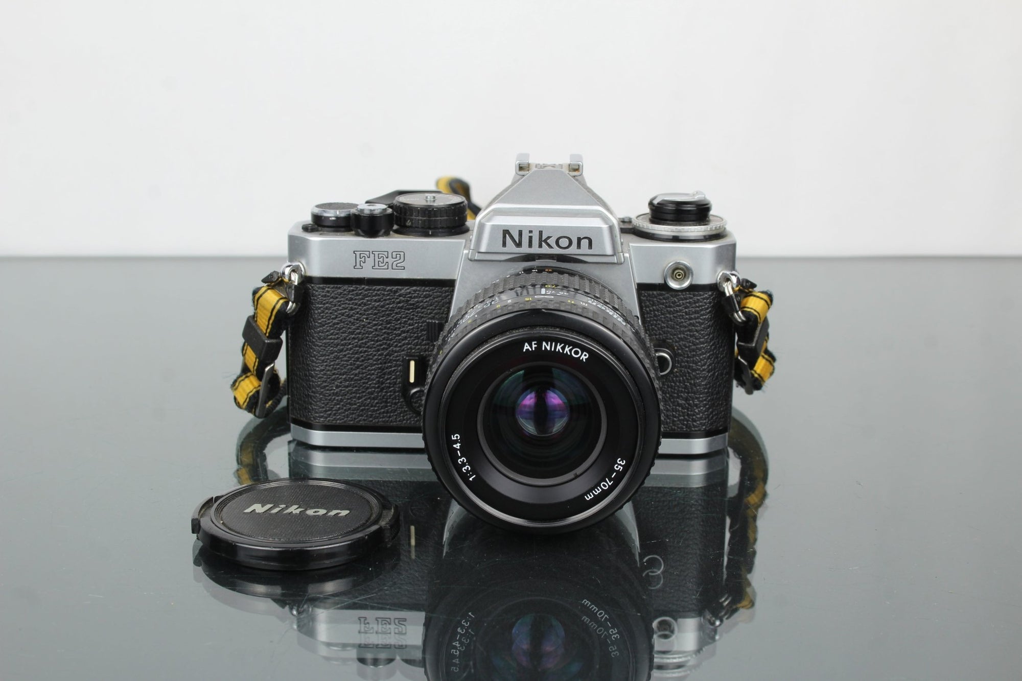 Nikon FE2 + Nikkor 35 - 70mm 1:3.3 - 4.5 lens - Dutch|Thrift