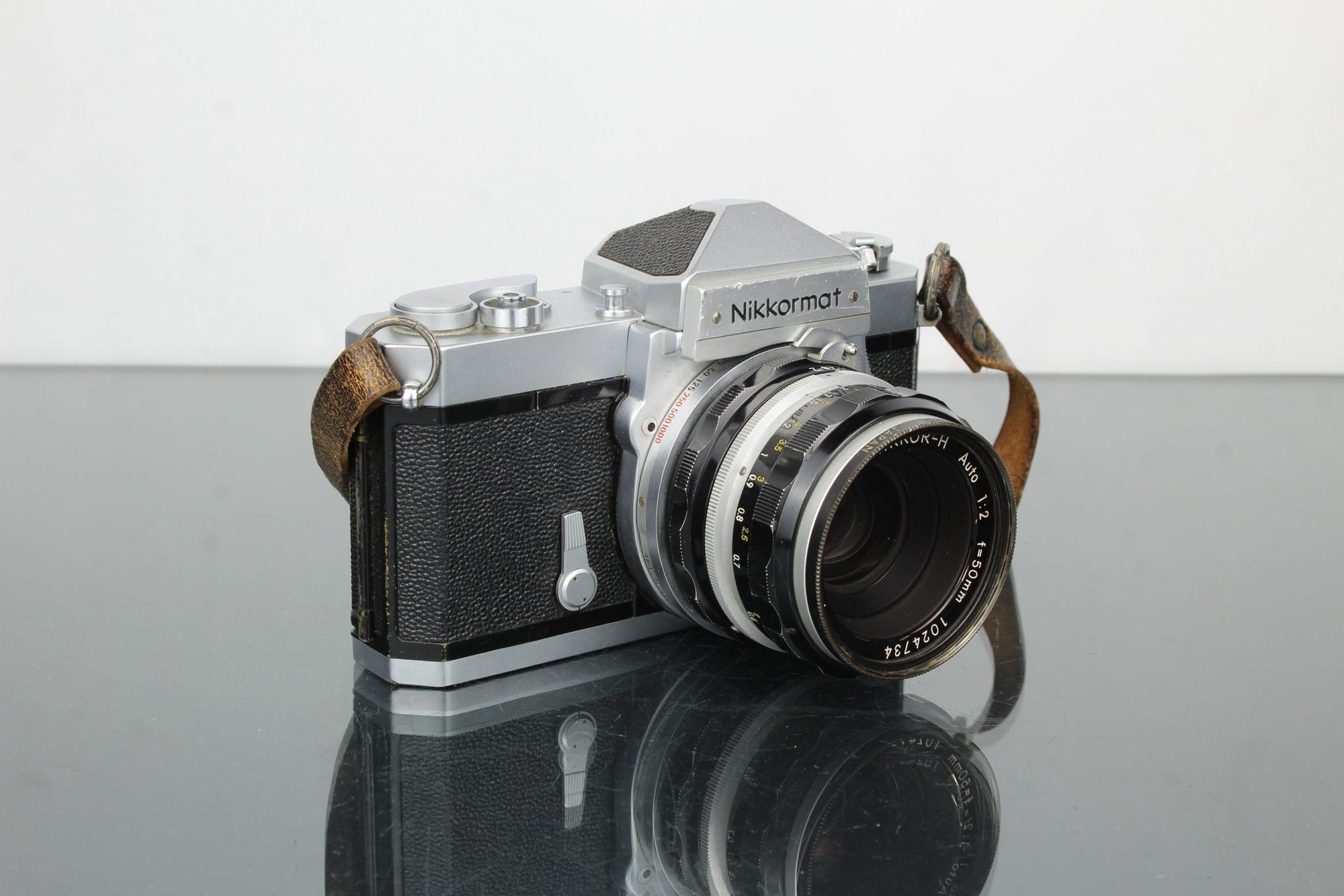 Nikon Nikkormat FT + Nikon Nikkor - H Auto 1:2 f=50mm - Dutch|Thrift