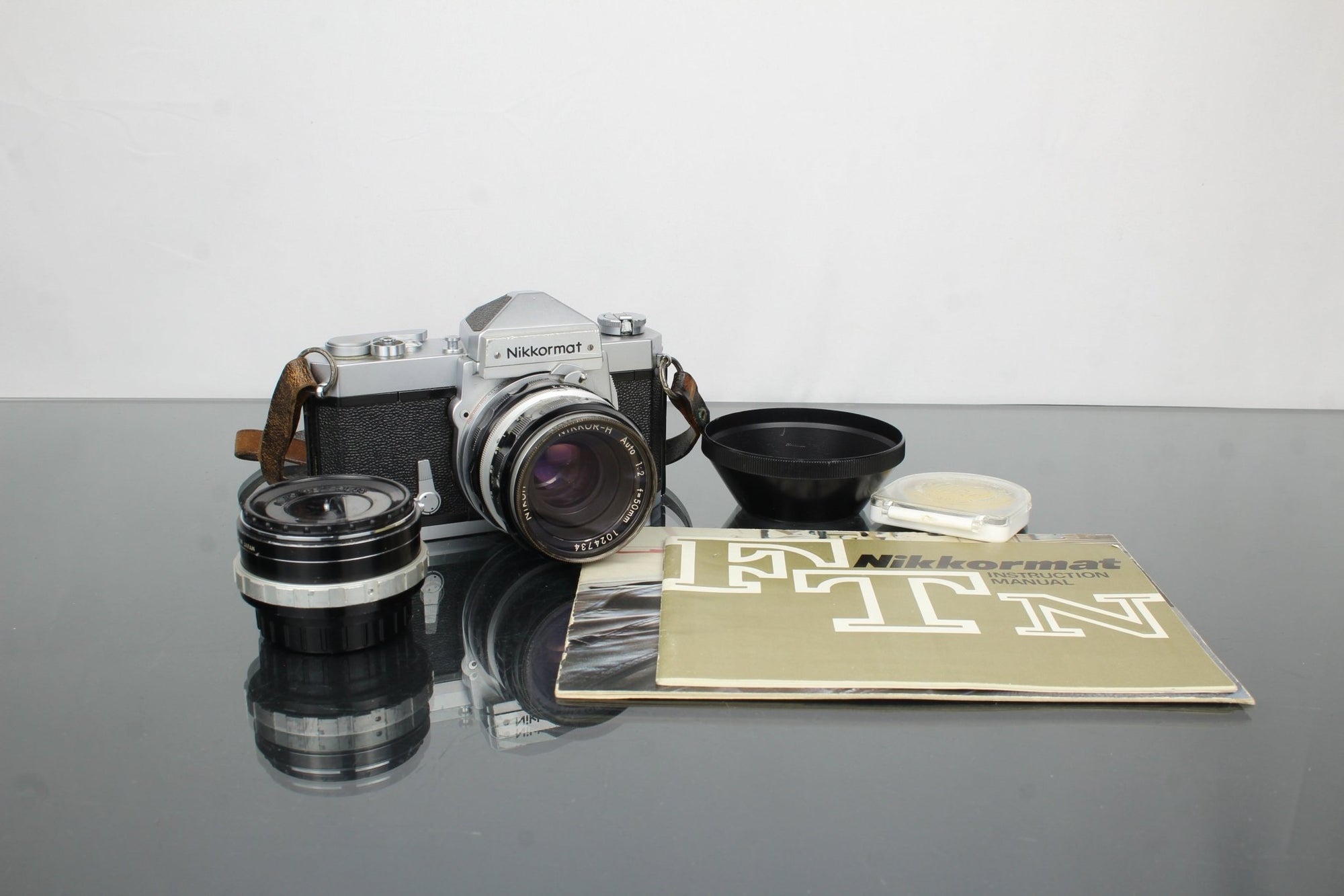 Nikon Nikkormat FT + Nikon Nikkor - H Auto 1:2 f=50mm - Dutch|Thrift